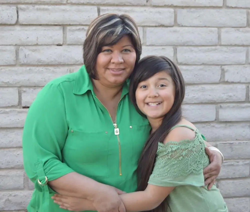 Mariana and Nora hugging